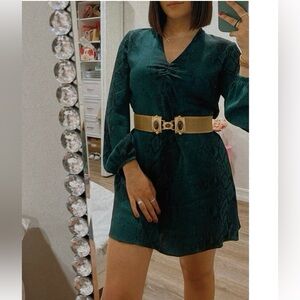 Women’s emerald green dress with black patterns. Size S